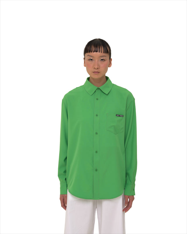 Female model front view wearing Vault Urban green Stay Fresh shirt – wrinkle-free sustainable women’s workwear