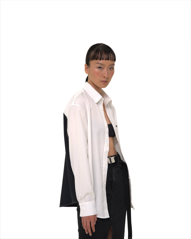 Angled view of female model in Vault Urban monochrome Stay Fresh shirt – versatile sustainable shirt