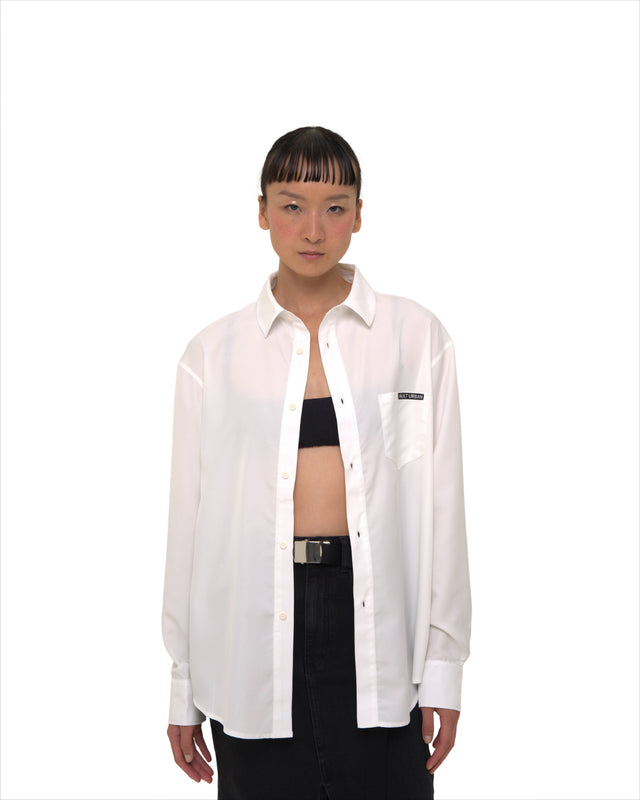 Female model front view in Vault Urban monochrome Stay Fresh shirt – sustainable wrinkle-free women’s office wear