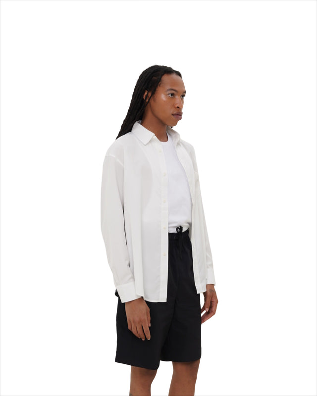 Angled view of male model in Vault Urban monochrome Stay Fresh shirt – ethical workwear