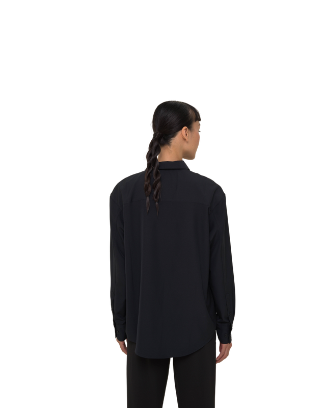Back view of Vault Urban Stay-Fresh Wrinkle-Free Shirt in Black Female Fit