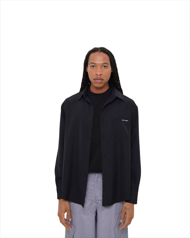 Male model wearing Vault Urban Stay-Fresh Wrinkle-Free Shirt in Black – front view