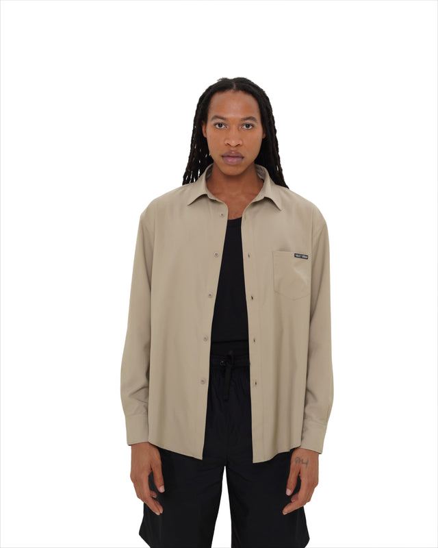 Male model wearing Vault Urban Stay-Fresh Wrinkle-Free Shirt in Taupe – front view